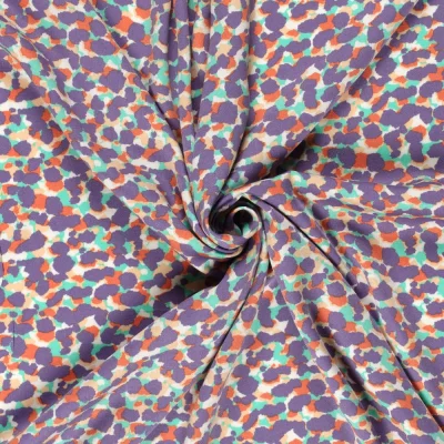 Tissu Viscose satiné Pois destructurés sur fond Parme - Par 10 cm