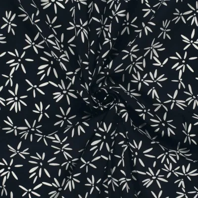 Tissu Coton extensible Pissenlit mode sur fond Bleu marine - Par 10 cm