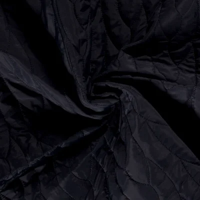 Tissu Matelassé réversible Lignes abstraites sur fond Bleu marine - Par 10 cm