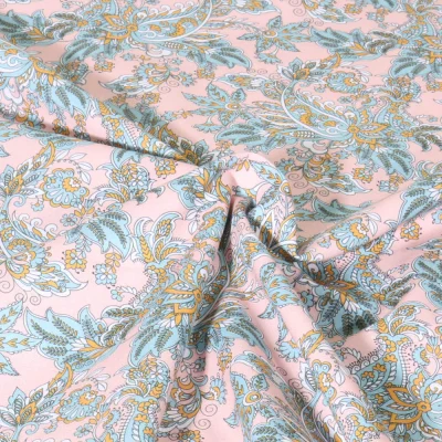 Tissu Popeline de Coton Paisley bleu ciel sur fond Rose clair - Par 10 cm