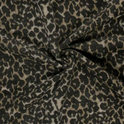 Tissu Jacquard toucher laine Eris léopard Noir sur fond Beige sable - Par 10 cm