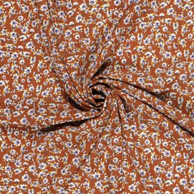 Tissu crêpe de viscose Lurex Sandi fleuris sur fond Brique - Par 10 cm