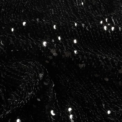 Tissu Sequins magique  Luxa extensible  sequins Noir sur fond Noir - Par 10 cm