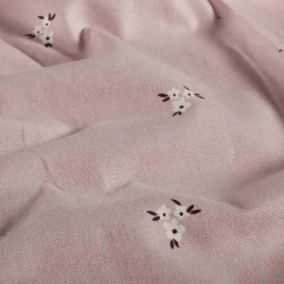 Tissu Flanelle de Coton Lina bouquets floraux Blanc sur fond Rose poudré - Par 10 cm