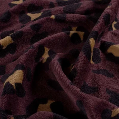 Tissu Velours tout doux Tess motif léopard sur fond Prune foncé - Par 10 cm