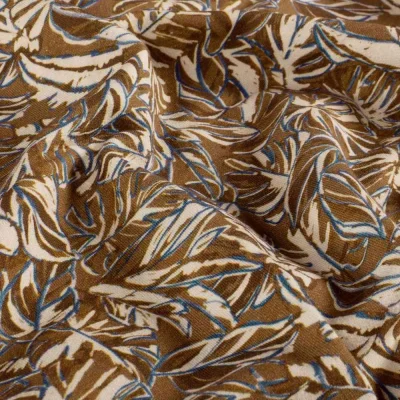 Tissu Sweat léger French Terry Marina extensible feuilles Ecru sur fond Marron - Par 10 cm