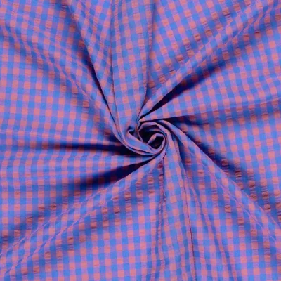 Tissu Seersucker Carreaux rose sur fond Violet - Par 10 cm