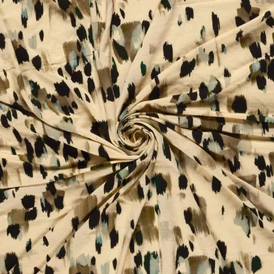 Tissu Jersey Viscose digital tacheté stylisé léopard sur fond Beige sable - Par 10 cm