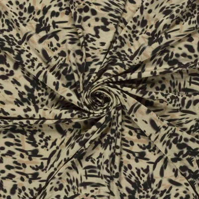 Tissu Jersey Viscose digital motifs Léopard moderne sur fond Beige sable - Par 10 cm