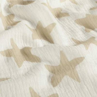 Tissu Double gaze de Coton Etoiles écrues sur fond Ecru - Par 10 cm
