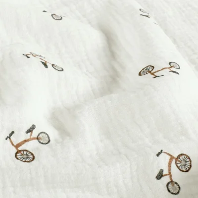 Tissu Double gaze de Coton petites draisienne sur fond Blanc cassé - Par 10 cm