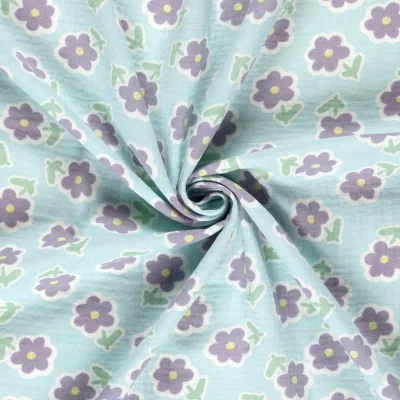 Tissu Double gaze de Coton Fleuris lilas sur fond Bleu ciel - Par 10 cm