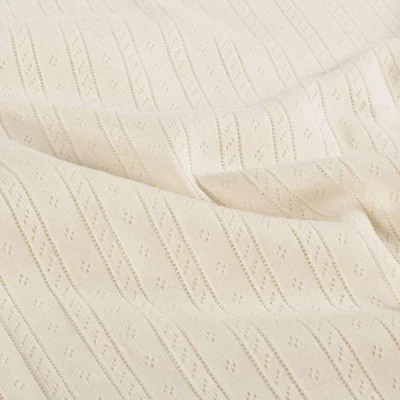Tissu Jersey Coton ajouré Camille uni Ivoire - Par 10 cm