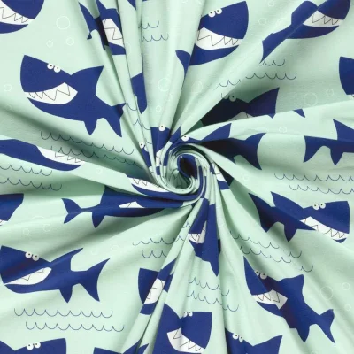 Tissu Jersey Coton imprimé Requins bleus sur fond Bleu azur - Par 10 cm