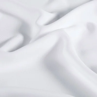 Tissu Crêpe satiné mat uni Blanc - Par 10 cm