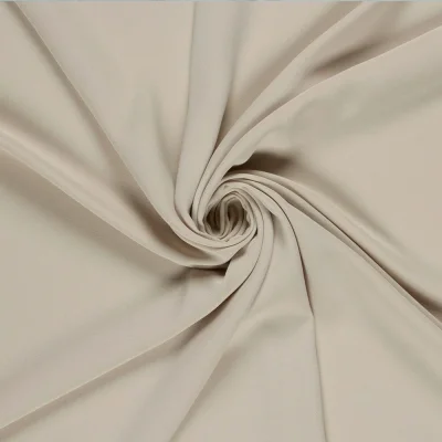 Tissu Crêpe satiné mat uni Beige clair - Par 10 cm