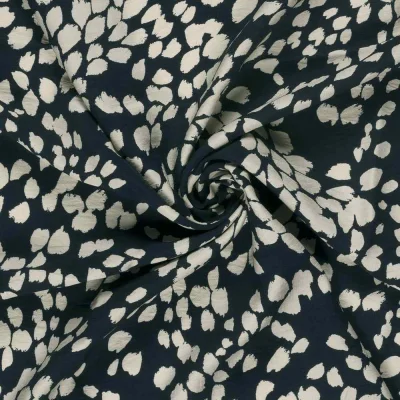 Tissu crêpe de viscose imprimé Étoile Fleuris blanc sur fond Bleu marine - Par 10 cm