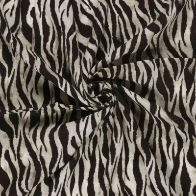 Tissu crêpe de viscose imprimé motif zèbre sur fond Noir - Par 10 cm