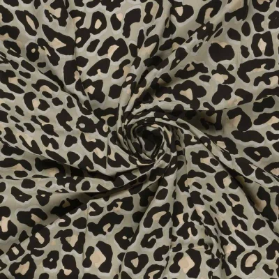Tissu Viscose imprimé Joana motif léopard sur fond Beige - Par 10 cm