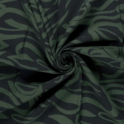 Tissu Viscose twill Pia arabesques sur fond Vert - Par 10 cm