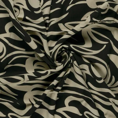 Tissu Viscose twill Pia arabesques sur fond Noir - Par 10 cm