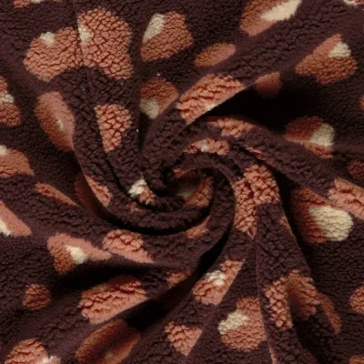Tissu Bouclette Sherpa imprimé léopard rose et écru sur fond Bordeaux - Par 10 cm