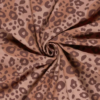 Tissu Softshell Digital Lili motif léopard Marron sur fond Vieux rose - Par 10 cm