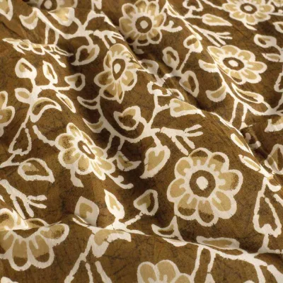 Tissu  Voile de Coton Batik Fleurs Kencana sur fond Bronze - Par 10 cm
