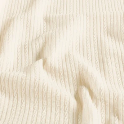 Tissu Maille Bord côte ajouré Chenille Torsadé uni Ecru - Par 10 cm