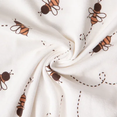 Tissu Maille Jersey Coton Maya abeilles sur fond Ecru - Par 10 cm