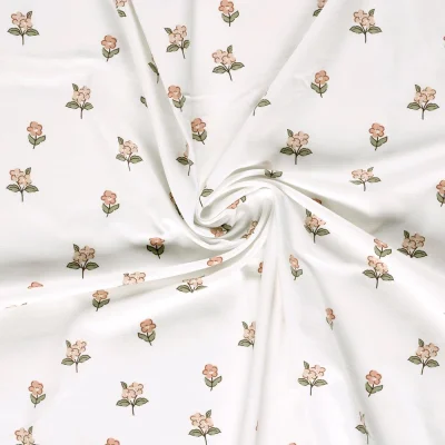 Tissu Jersey Coton imprimé Alix fleurs délicates sur fond Blanc cassé - Par 10 cm