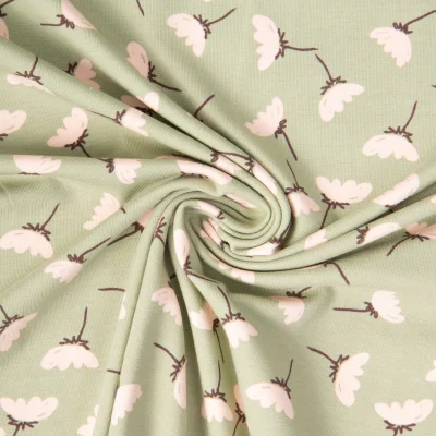 Tissu Jersey Coton imprimé June printanier sur fond Vert kaki clair - Par 10 cm