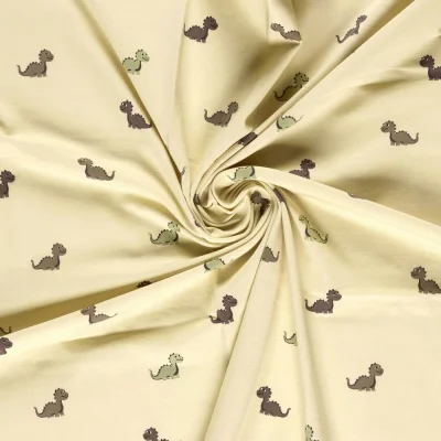 Tissu Jersey Coton imprimé Inès happy dino sur fond Beige - Par 10 cm