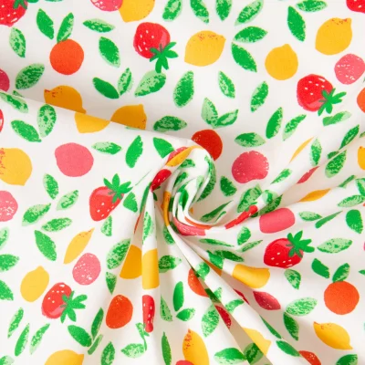 Tissu Coton enduit Navel Fraises, Citrons, Oranges sur fond Blanc - Par 10 cm