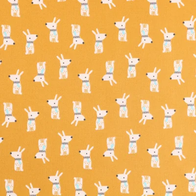 Tissu Coton imprimé Arty Lapins d&#039;Hiver Ecrus sur fond Moutarde - Par 10 cm