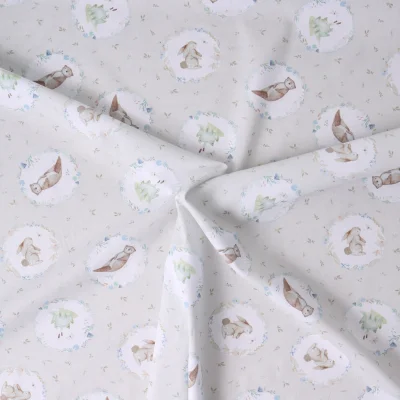 Tissu Coton imprimé Minofaune sur fond Ivoire - Par 10 cm