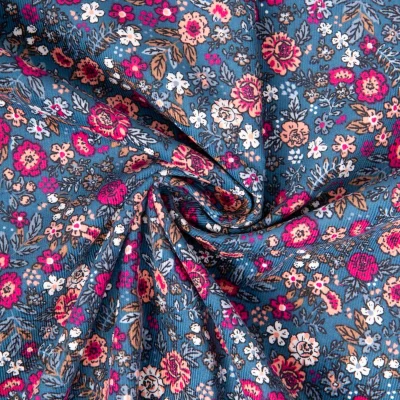 Tissu Velours milleraies imprimé Barjay fleuris bleu et rose sur fond Bleu jean - Par 10 cm