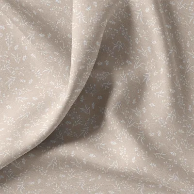 Tissu Coton imprimé floral  Luniva blanc sur fond Beige sable - Par 10 cm