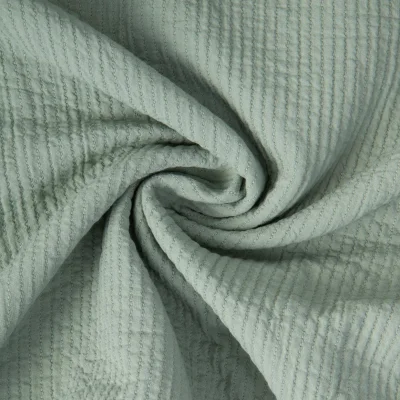 Tissu Coton surpiqué uni Vert amande - Par 10 cm
