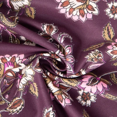 Tissu Toile de Coton Demi natté Daman floral sur fond Aubergine - Par 10 cm