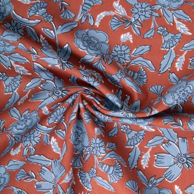 Tissu Coton imprimé Arty Jaeli floral bleu sur fond Marron - Par 10 cm