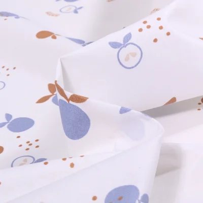 Tissu Coton enduit Jogala sur fond Blanc - Par 10 cm