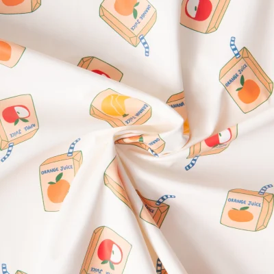 Tissu Imperméable imprimé Juicy sur fond Ecru - Par 10 cm