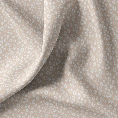 Tissu Coton imprimé léopard Kamar blanc sur fond Beige sable - Par 10 cm