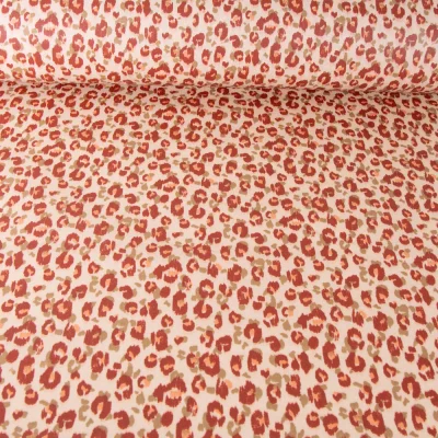Tissu Coton enduit Léopard sur fond Beige - Par 10 cm
