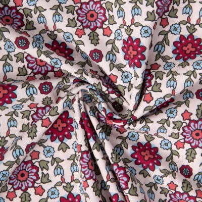 Tissu Coton imprimé Arty Kumba fleuris bordeaux sur fond Rose pâle - Par 10 cm