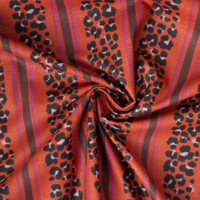 Tissu Toile de Coton Demi natté Leoli Léo rayé sur fond Terracotta - Par 10 cm