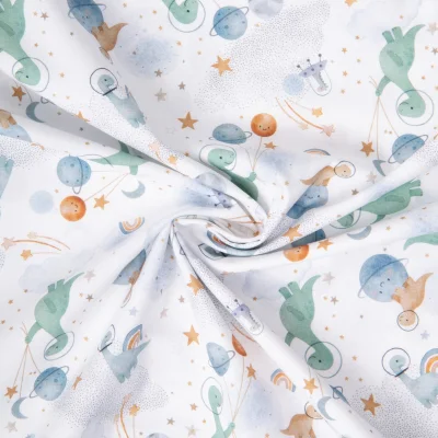 Tissu Coton imprimé digital Arty Ludidi dino dans l&#039;espace sur fond Blanc - Par 10 cm