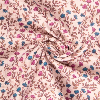 Tissu Double gaze de Coton Madeleine fleuris Rose et bleu sur fond Rose clair - Par 10 cm