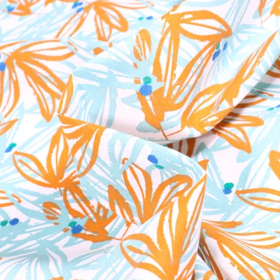 Tissu Coton imprimé Arty Nabali jaune et bleu sur fond Blanc - Par 10 cm